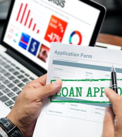 Download premium image of Loan Approved Application Form Concept about paper, men, money, laptop, and wooden table 300035